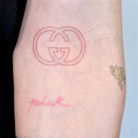 gucci logo tattoo